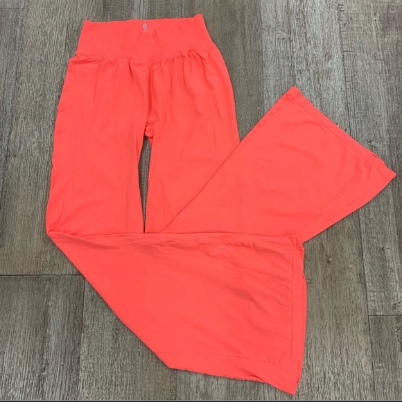 Free People Good Karma Flare Leggings Neon Coral NWOT - Picture 1 of 2